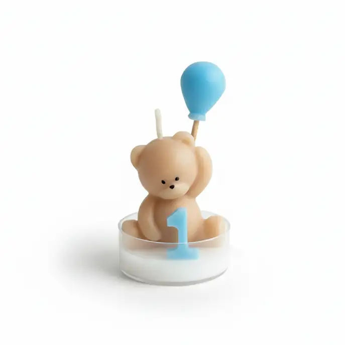 Teddy bear first birthday candle with blue balloon and number
